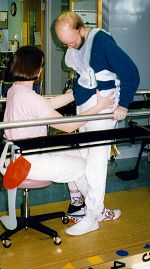Andy in physical therapy after leaving the hospital, late Dec. 1996