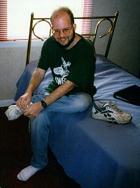 Andy getting ready to go outside, in his room at FINR, April 1997