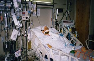 Andy in a coma in the ICU at Emory, early Dec. 1996